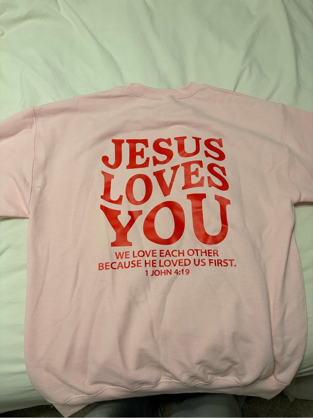 Pink "Jesus Loves You" Graphic Sweatshirt